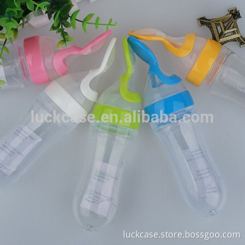 Squeezable Soft Colorful High Quality Food Grade Silicone Feeding Spoon with Bottle